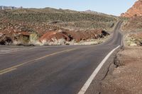 Highway Through Nevada Badlands: A Journey into Geology