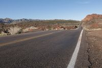 Highway Through Nevada Badlands: A Journey into Geology