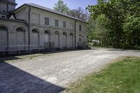 there is an old stone building in this photo to say goodbye to those who have passed