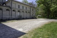 there is an old stone building in this photo to say goodbye to those who have passed