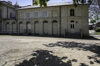 there is an old stone building in this photo to say goodbye to those who have passed