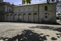 there is an old stone building in this photo to say goodbye to those who have passed