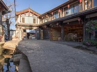 an empty, street that has been turned to look like a small town on the other side