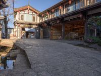 an empty, street that has been turned to look like a small town on the other side