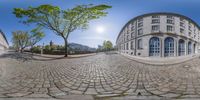 an old - fashioned stoned up circular photo is taken from the ground with a panoramic lens