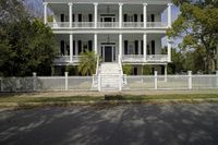 this is an ornately decorated home in the suburbs of savannah, ga with wrought railings