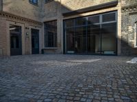 Historic Warehouse in Berlin: Cobblestone Courtyard and Classic Architecture