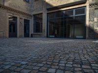 Historic Warehouse in Berlin: Cobblestone Courtyard and Classic Architecture