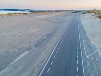 Holland's Aerial View: Straight Road Leading to the Ocean