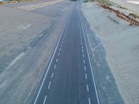 Holland's Aerial View: Straight Road Leading to the Ocean