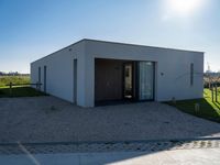 Holland Architecture with Wood, Asphalt, and Gravel