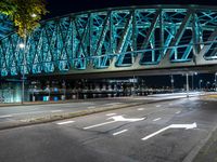 Holland City: A Bridge at Night Overlooking the River