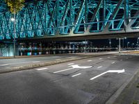 Holland City: A Bridge at Night Overlooking the River