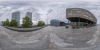 a series of fish - eye pictures depicting a city park and buildings in the background