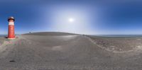 this is a 360 - view image of a lighthouse with a white and red tower