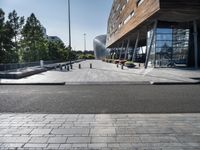 a long walkway going through a museum building next to the street in front of it