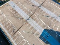 the aerial view of an empty parking lot where airplanes are parked and waiting for people