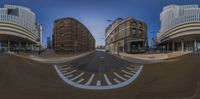 a view of the street as seen through a 360 - ray lens on a skateboard