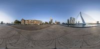 a panoramic view of a city as seen through an eye lens with reflection