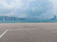 the view of an airport runway with a jet plane on it's tarmac