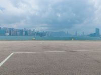 the view of an airport runway with a jet plane on it's tarmac