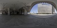 a group of large circular windows in a building with circular designs on the outside of them