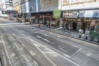 this is an image of people walking down the street from the tram track in china