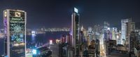 city skyline in night time, with skyscrapers in the foreground and skyscraper buildings at the edge