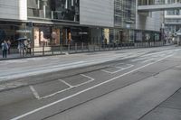 Hong Kong Mixed-Use Building: Asphalt Road in the City