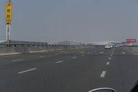 Hong Kong: Clear Sky with Bridge and Highway