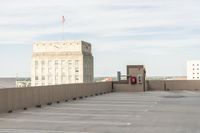 there is a large building that sits behind the building in this photo and looks out