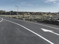 Iceland Landscape with Asphalt Road and Grass