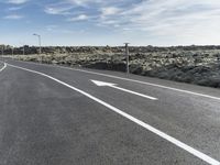 Iceland Landscape with Asphalt Road and Grass