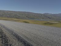 Iceland Landscape Road through Grass Field 007