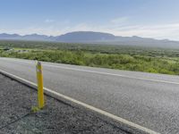 Iceland Landscape: Road, Mountain, and Clouds