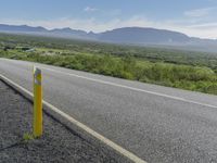 Iceland Landscape: Road, Mountain, and Clouds