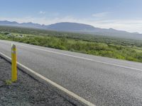 Iceland Landscape: Road, Mountain, and Clouds