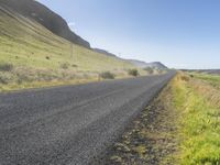 Iceland Mountain Landscape: Road, Trees, and Grass