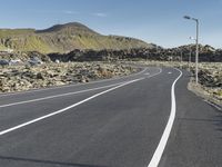 Mountain Road in Iceland: A Stunning Landscape with Clouds