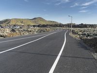 Mountain Road in Iceland: A Stunning Landscape with Clouds