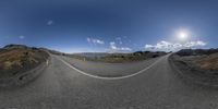 this is an image of a 360 - cam of a winding road on a mountain