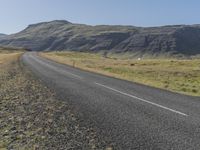 Iceland's Nature: Clear Sky, Grass, and a Slope