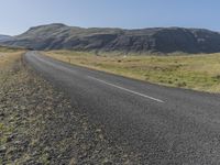 Iceland's Nature: Clear Sky, Grass, and a Slope