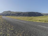 Iceland's Nature: Clear Sky, Grass, and a Slope