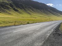 Iceland Road: Asphalt and Mountain Views