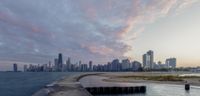 a body of water next to some very pretty buildings in the city of chicago, il