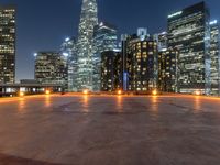 the city skylines are illuminated at night in this time lapshoton photograph taken