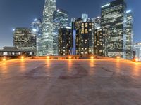 the city skylines are illuminated at night in this time lapshoton photograph taken