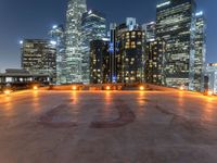 the city skylines are illuminated at night in this time lapshoton photograph taken