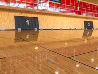 this is the gym floor for people to play basketball and basketball, the size of an indoor court